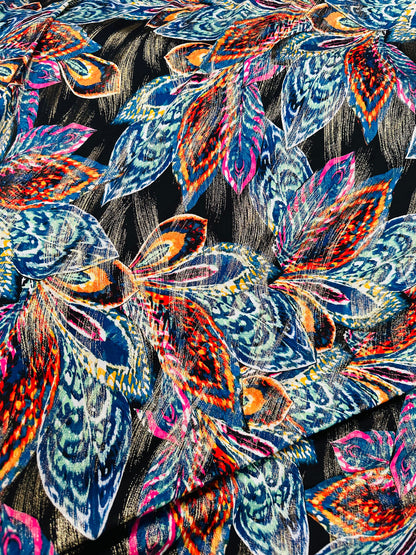 New Feathers design on metallic poly spandex 2-way stretch 58/60”