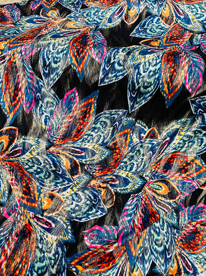 New Feathers design on metallic poly spandex 2-way stretch 58/60”