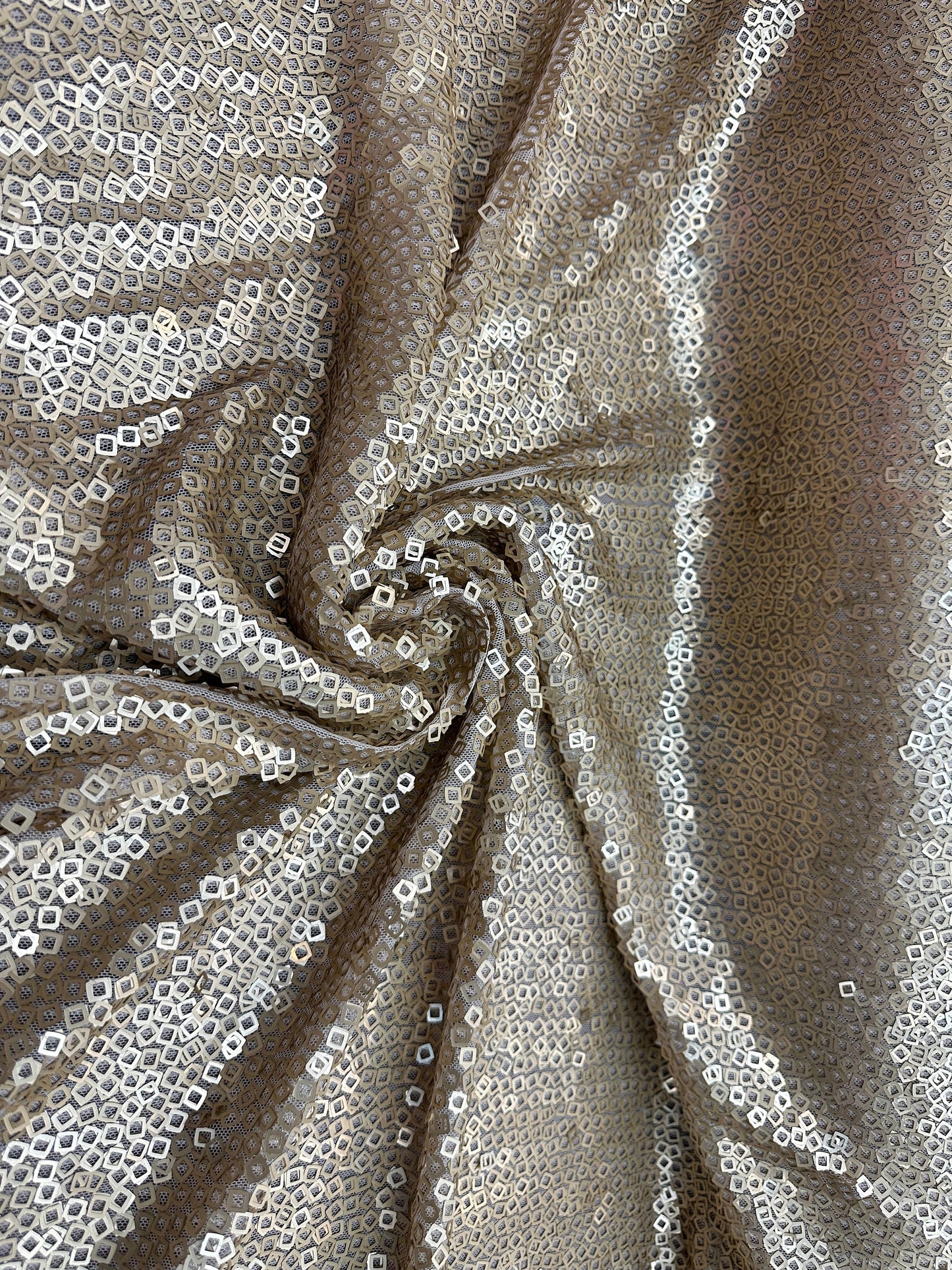 New Geometric sequins design dangling on stretch mesh 2-way 55/57” Sold by the YD.