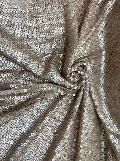 New Geometric sequins design dangling on stretch mesh 2-way 55/57” Sold by the YD.