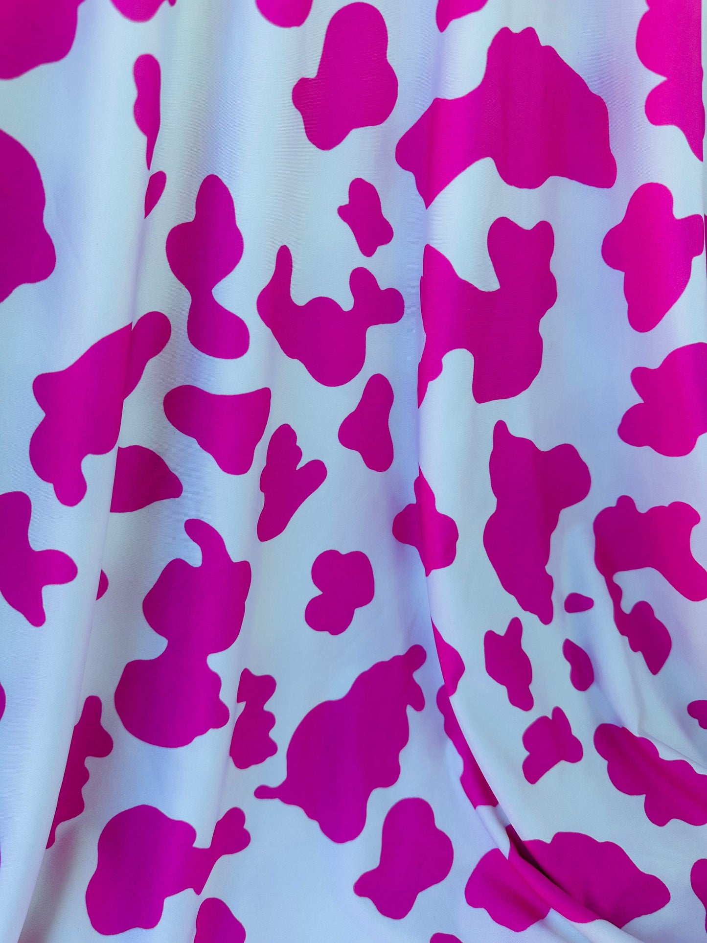 Cow design exotic animal print on great quality of poly spandex 4-way stretch 58/60” Sold by the YD. Ships worldwide from Los Angeles Ca