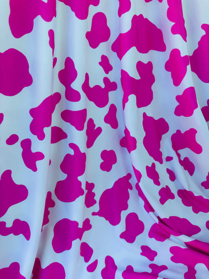 Cow design exotic animal print on great quality of poly spandex 4-way stretch 58/60” Sold by the YD. Ships worldwide from Los Angeles Ca