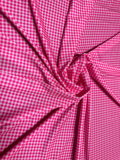 Gingham design 1/4” Hot pink color print on great quality of nylon spandex 4-way stretch 58/60”