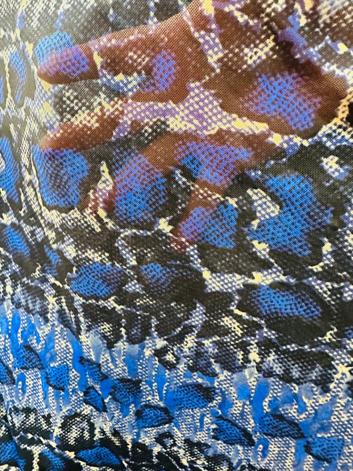 Exotic Snake design sapphire/Taupe print on great quality of nylon power mesh 4-way stretch 58/60” Sold by the YD. Ships worldwide