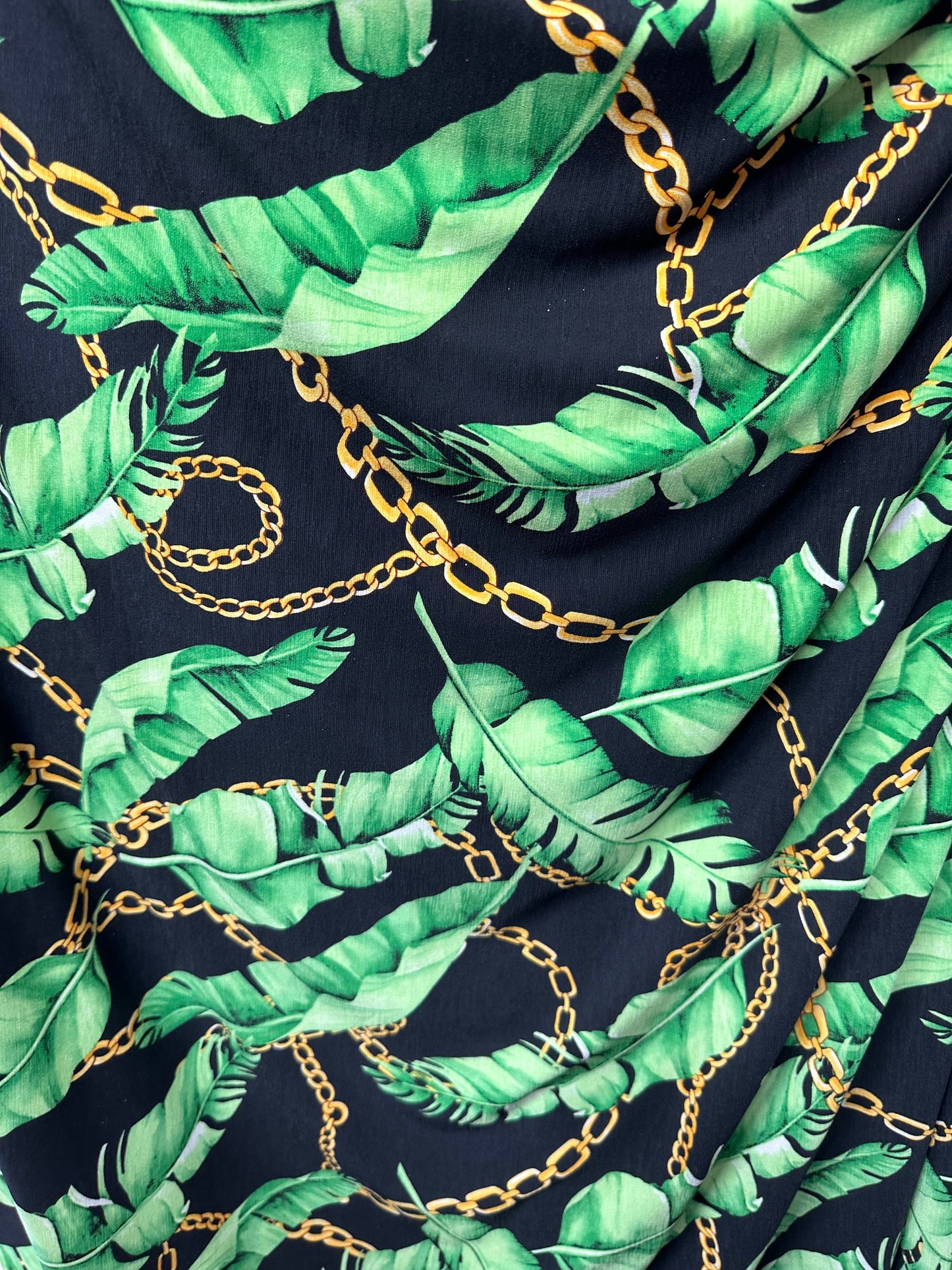 New leaves design print on great quality of poly spandex 4-way stretch 58/60”