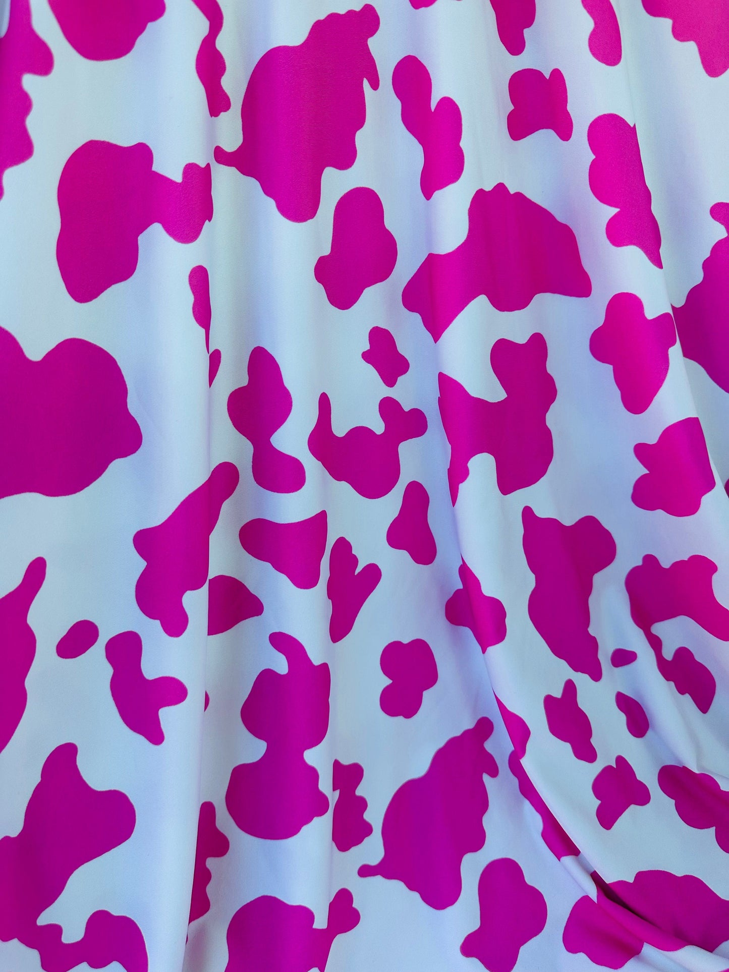 Cow design exotic animal print on great quality of poly spandex 4-way stretch 58/60” Sold by the YD. Ships worldwide from Los Angeles Ca