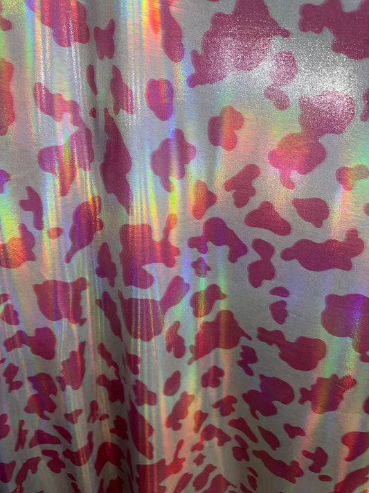 Cow exotic design Iridescent metallic nylon spandex with foggy foil 4-way stretch 58/60” Sold by the YD. Hi quality fabrics by AlexLAFabrics