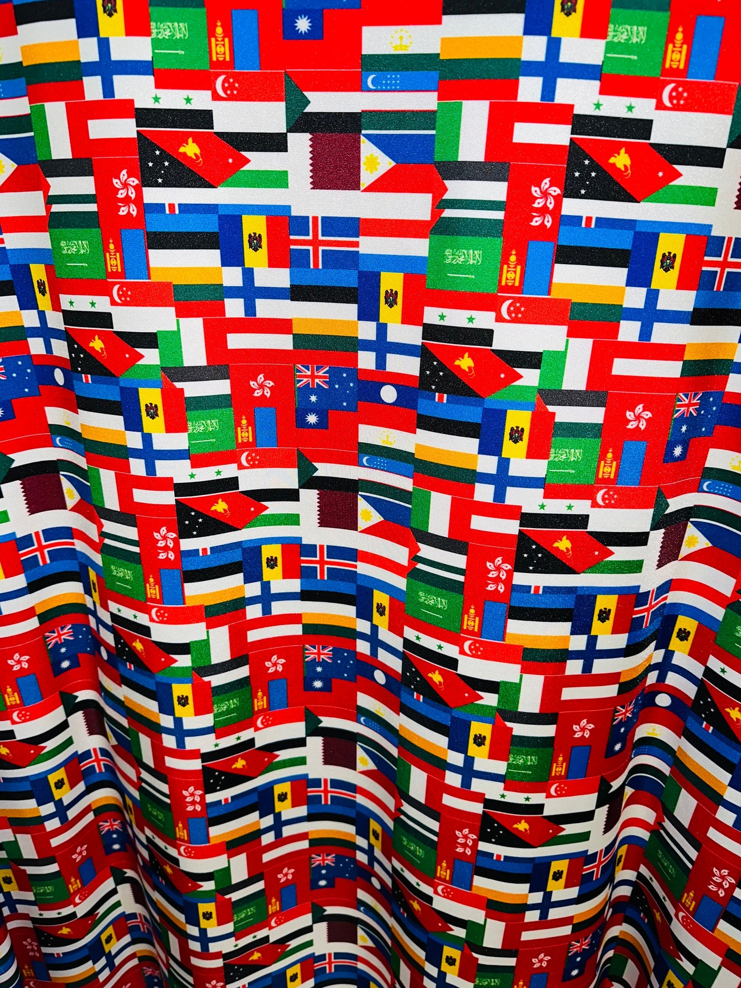 Nations flags design print on great quality of nylon spandex 4-way stretch 58/60” Sold by the YD.