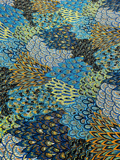 Peacock abstract design print on great quality of poly spandex medium weight 4-way stretch 58/60” Sold by the YD.