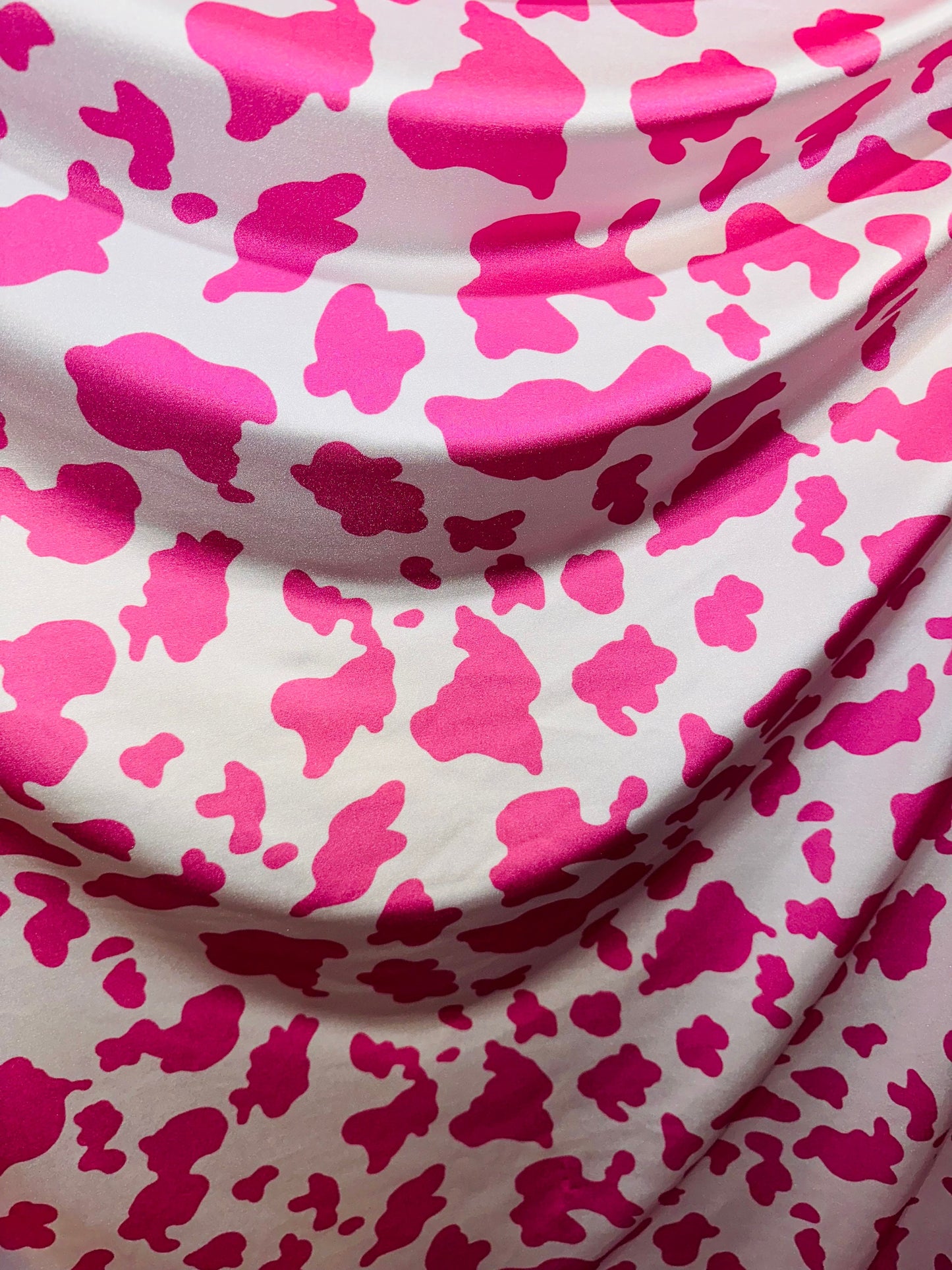 Cow design on shiny nylon spandex 4-way stretch pink/white 58/60” High quality fabrics by AlexLAFabrics