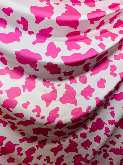 Cow design on shiny nylon spandex 4-way stretch pink/white 58/60” High quality fabrics by AlexLAFabrics