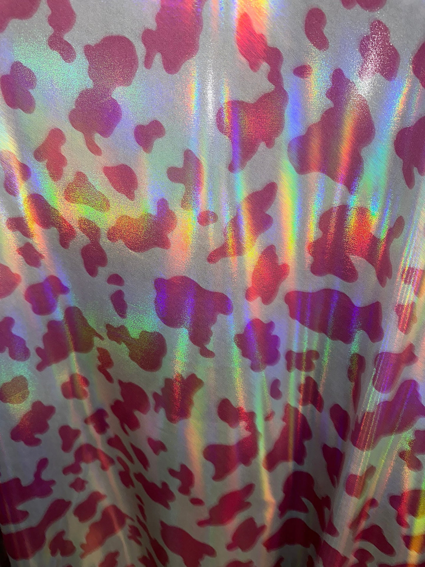 Cow exotic design Iridescent metallic nylon spandex with foggy foil 4-way stretch 58/60” Sold by the YD. Hi quality fabrics by AlexLAFabrics