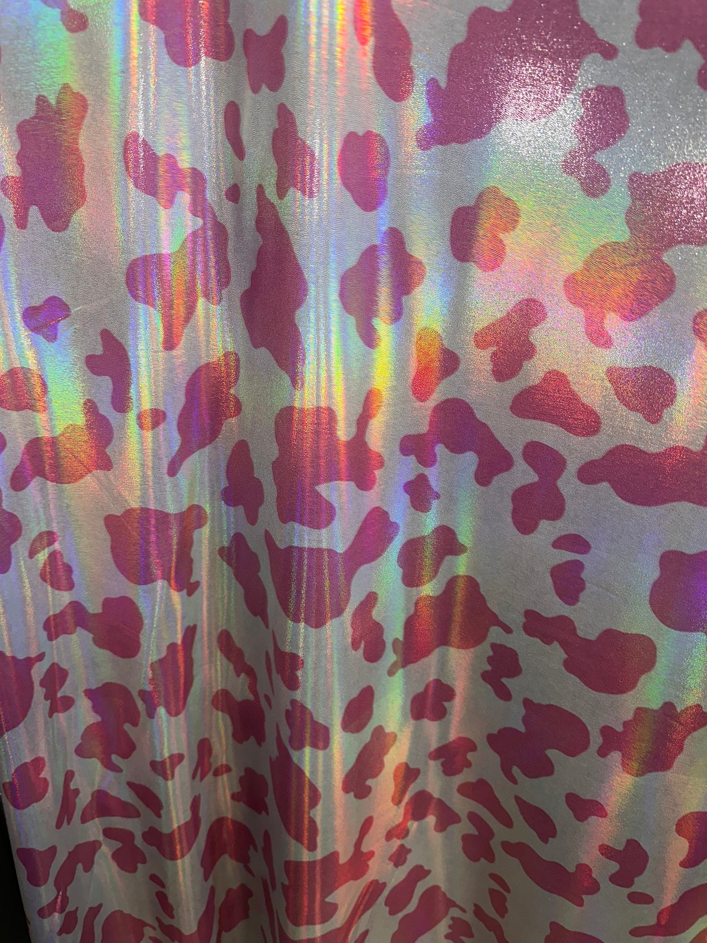 Cow exotic design Iridescent metallic nylon spandex with foggy foil 4-way stretch 58/60” Sold by the YD. Hi quality fabrics by AlexLAFabrics