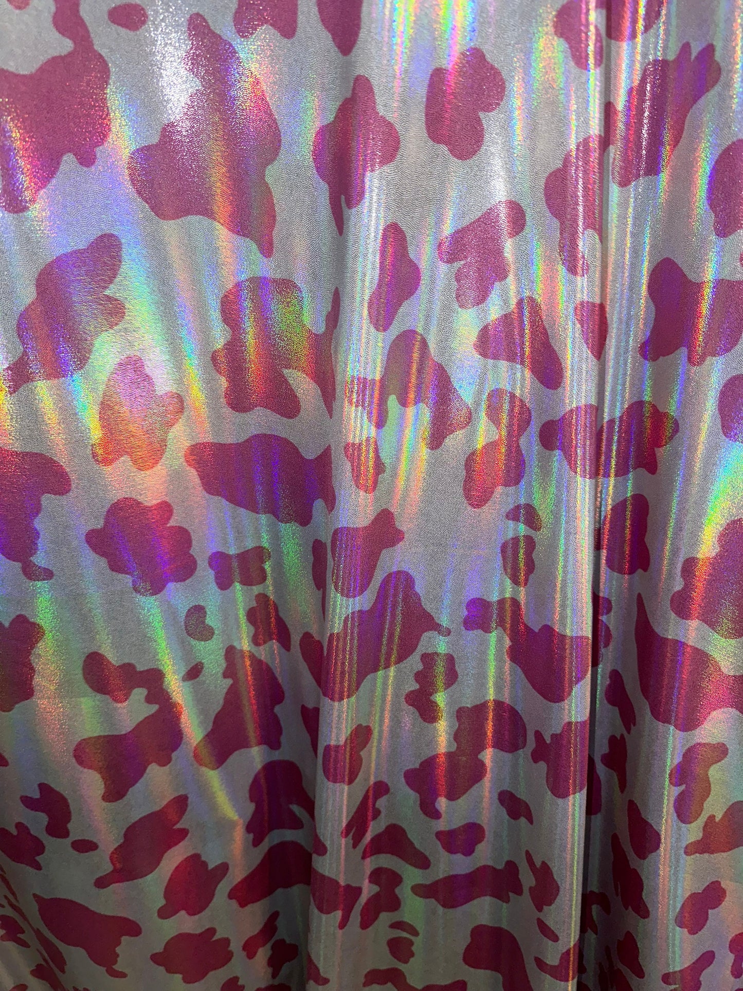 Cow exotic design Iridescent metallic nylon spandex with foggy foil 4-way stretch 58/60” Sold by the YD. Hi quality fabrics by AlexLAFabrics