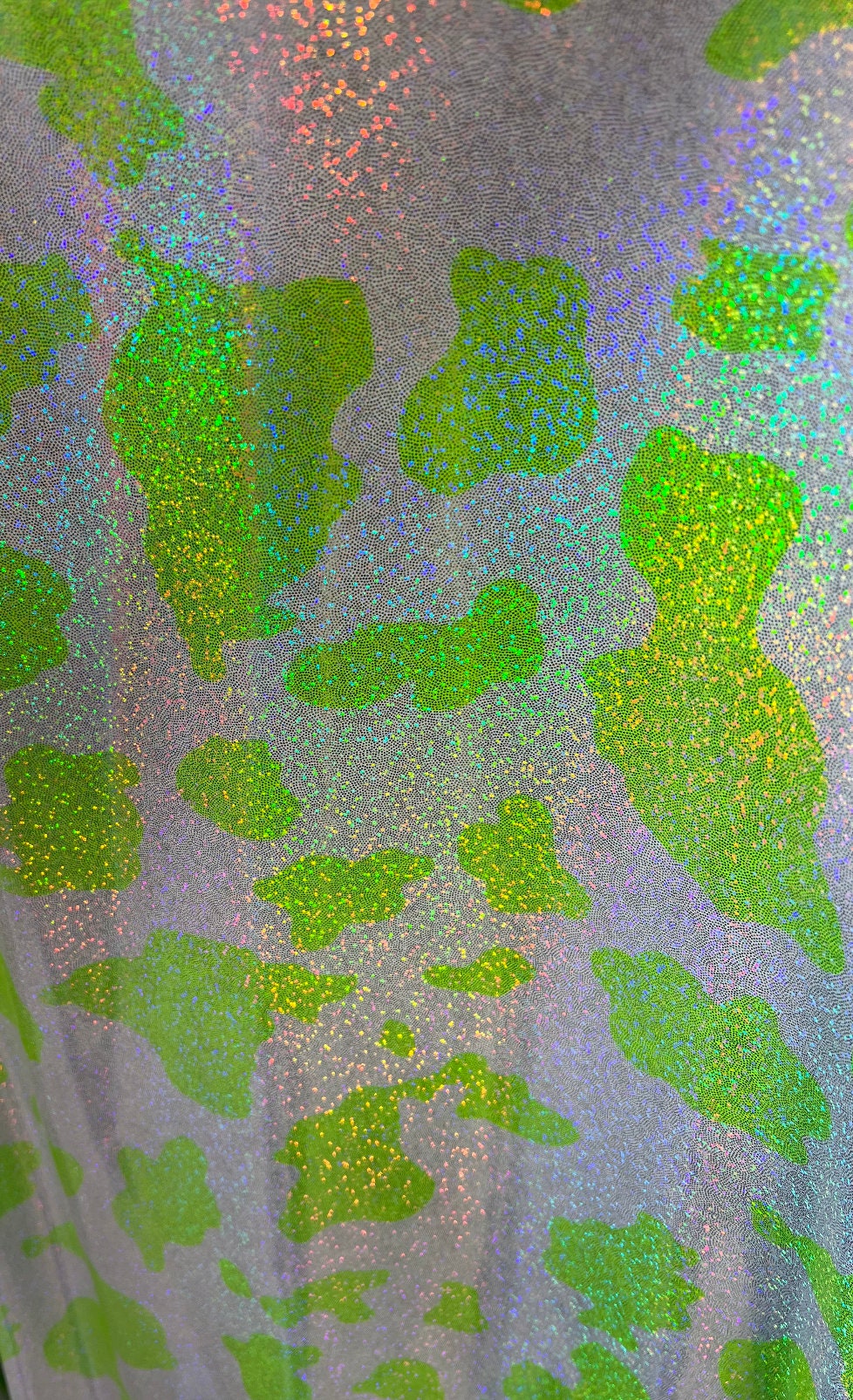 Exotic Cow design on best quality of hologram metallic nylon spandex 4-way stretch 58/60”