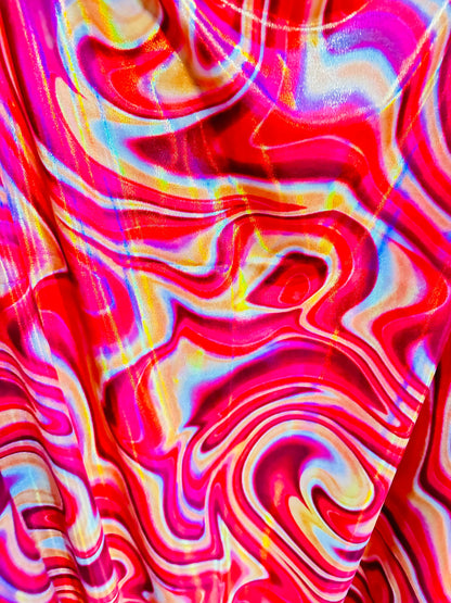 New Modern abstract lava design on Iridescent metallic nylon spandex 4-way stretch 58/60” Sold by the YD.