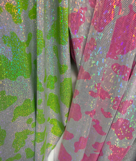 Exotic Cow design on best quality of hologram metallic nylon spandex 4-way stretch 58/60”